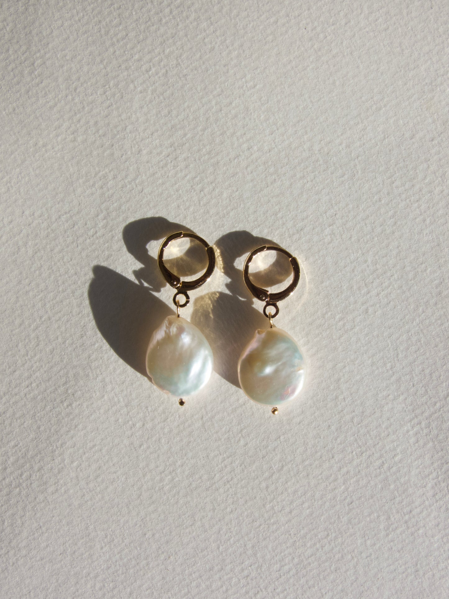 circular pearl earring